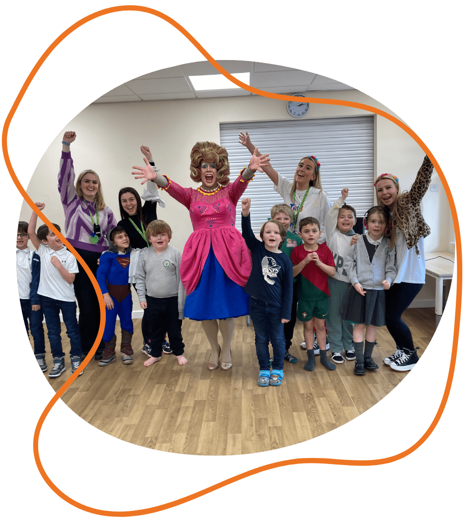 Students with drag queen and staff at Cavendish View School